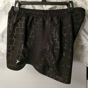 Running shorts, black with reflective black lines